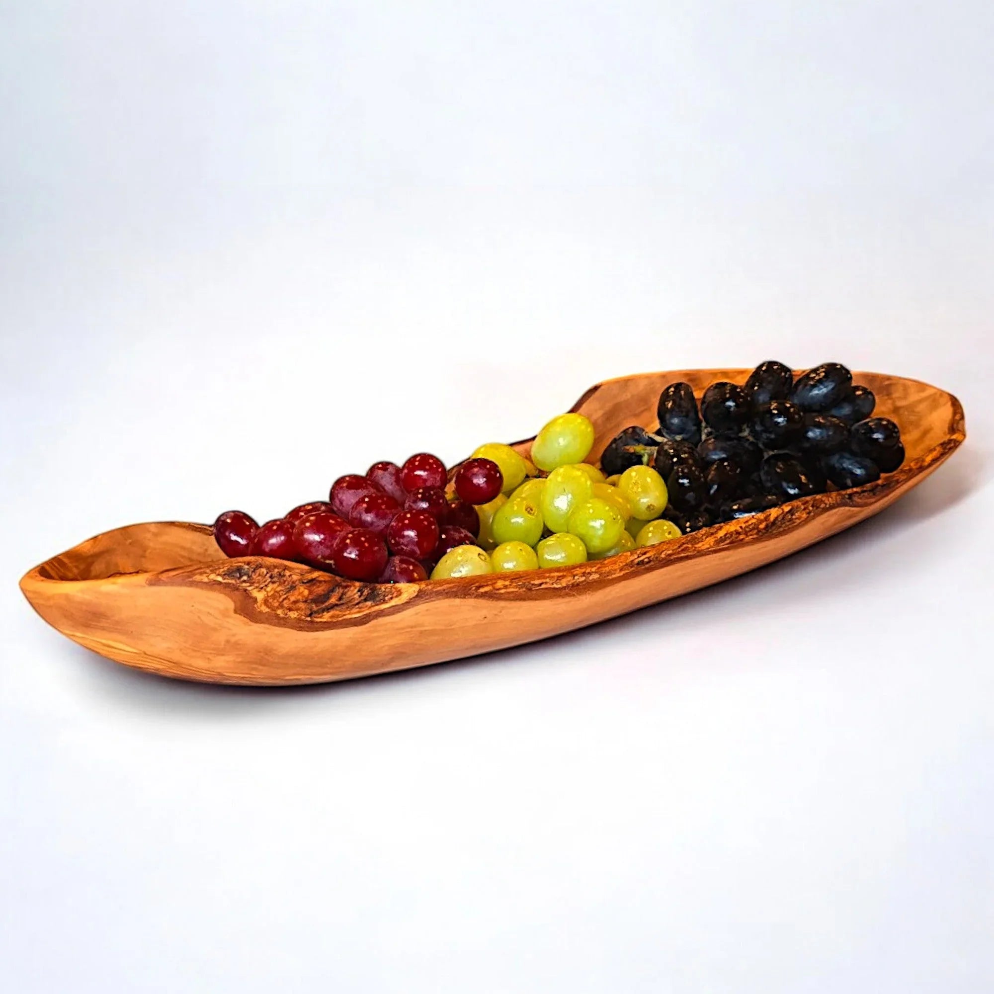 Olive wood large boat shaped serving – handcrafted, natural design