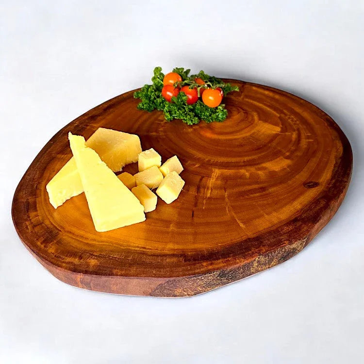 Rustic round olive wood cutting – handcrafted and natural design
