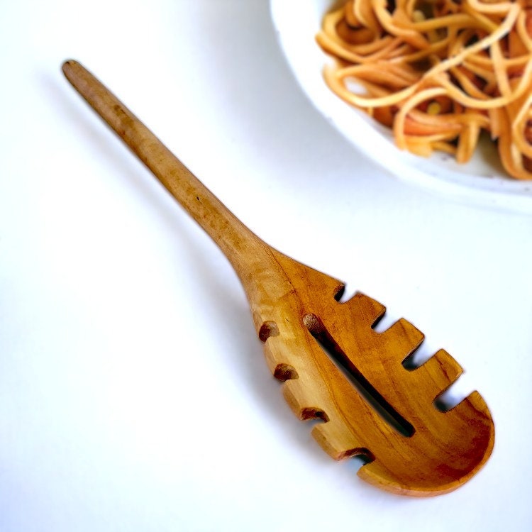 Pasta fork with hole