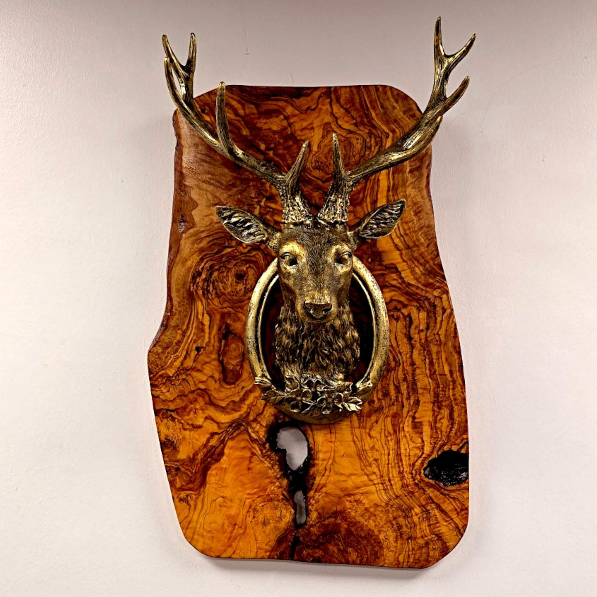 Rustic wall mounted metal stag head with rustic olive wood base