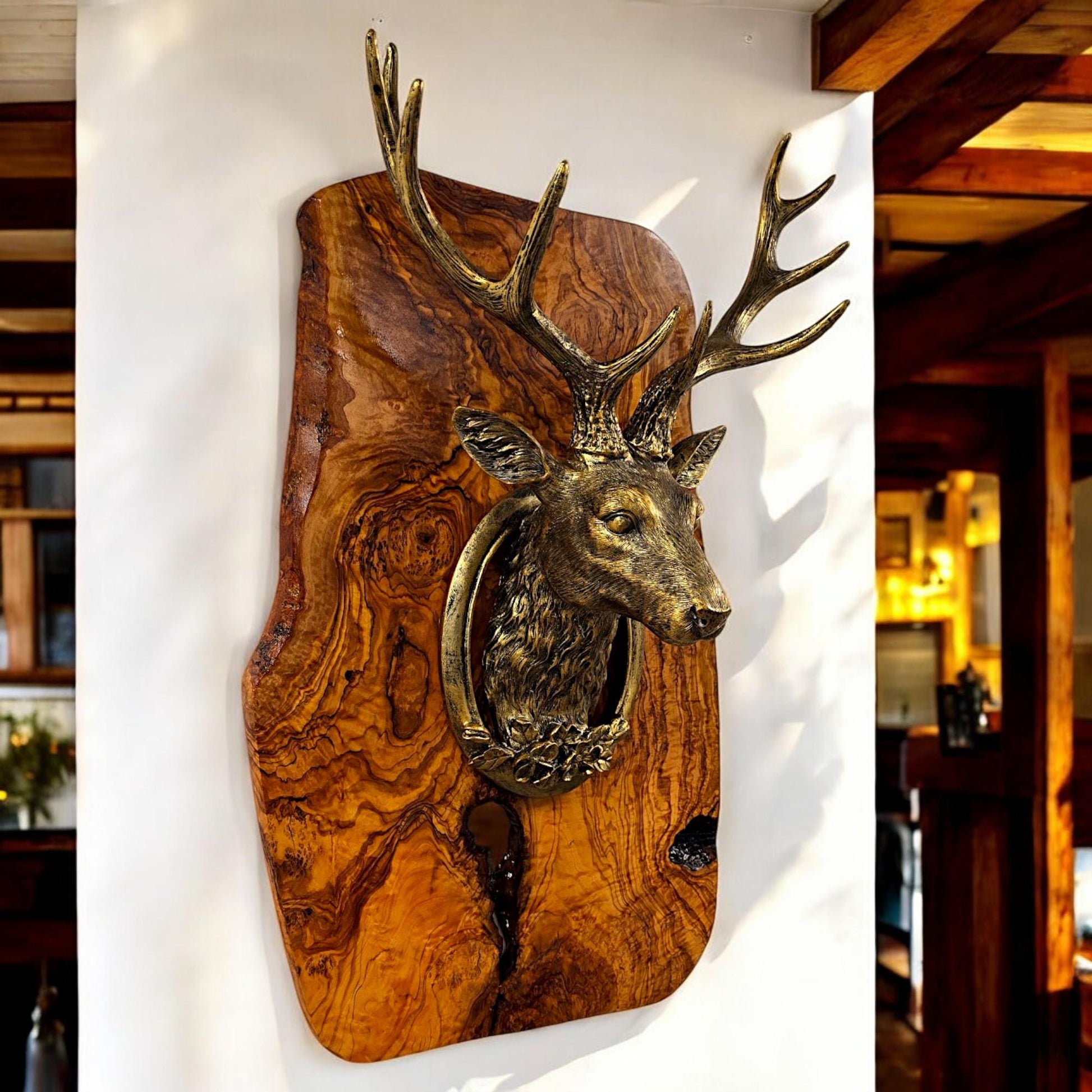 Rustic wall mounted metal stag head with rustic olive wood base