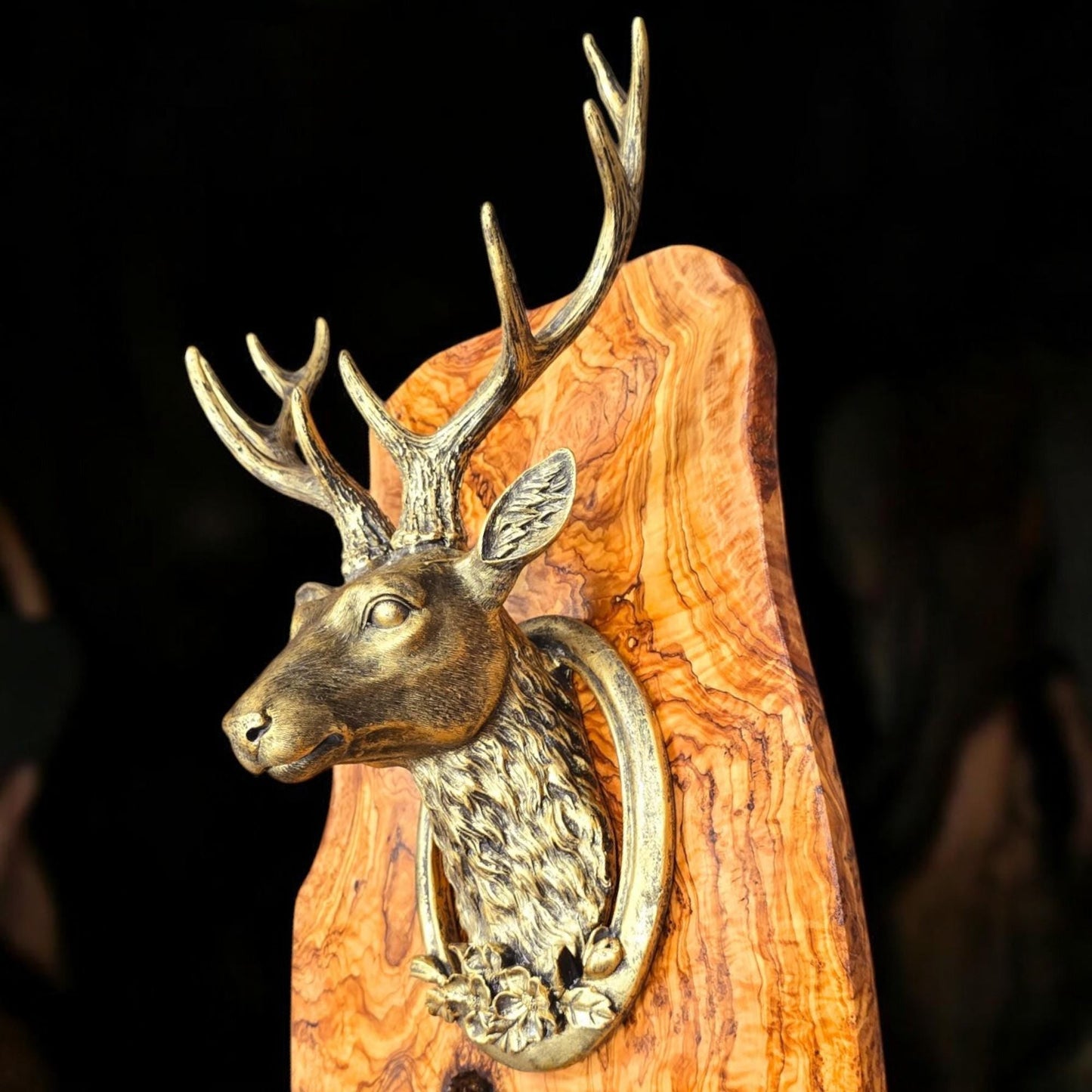 Rustic wall mounted metal stag head with rustic olive wood base