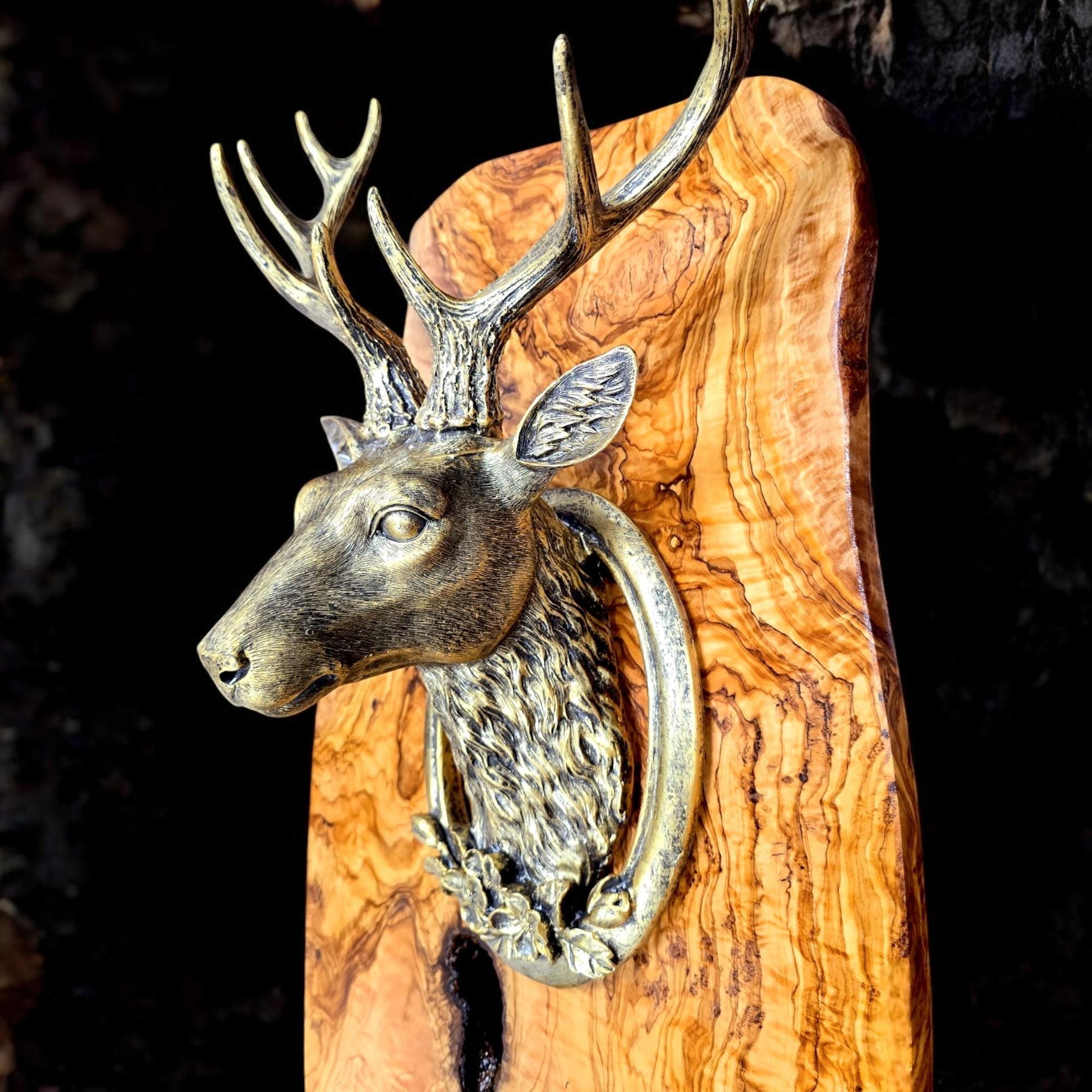 Rustic wall mounted metal stag head with rustic olive wood base